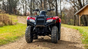 Rancher on dirt road, Front facing. Avenger Red,