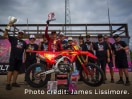 The Honda racing team behind a Competition dirt bike 
