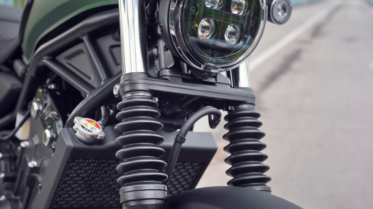 The shocks of a Honda standard motorcycle up close 