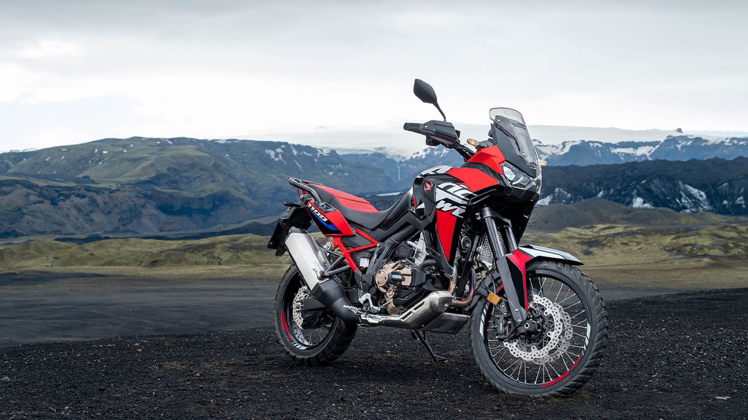 A parked Africa Twin in the mountains