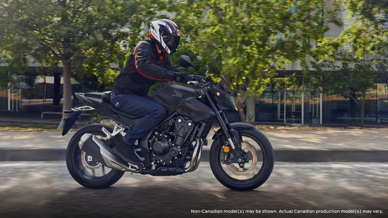 An rider on a CB500F, non Canadian model may be shown