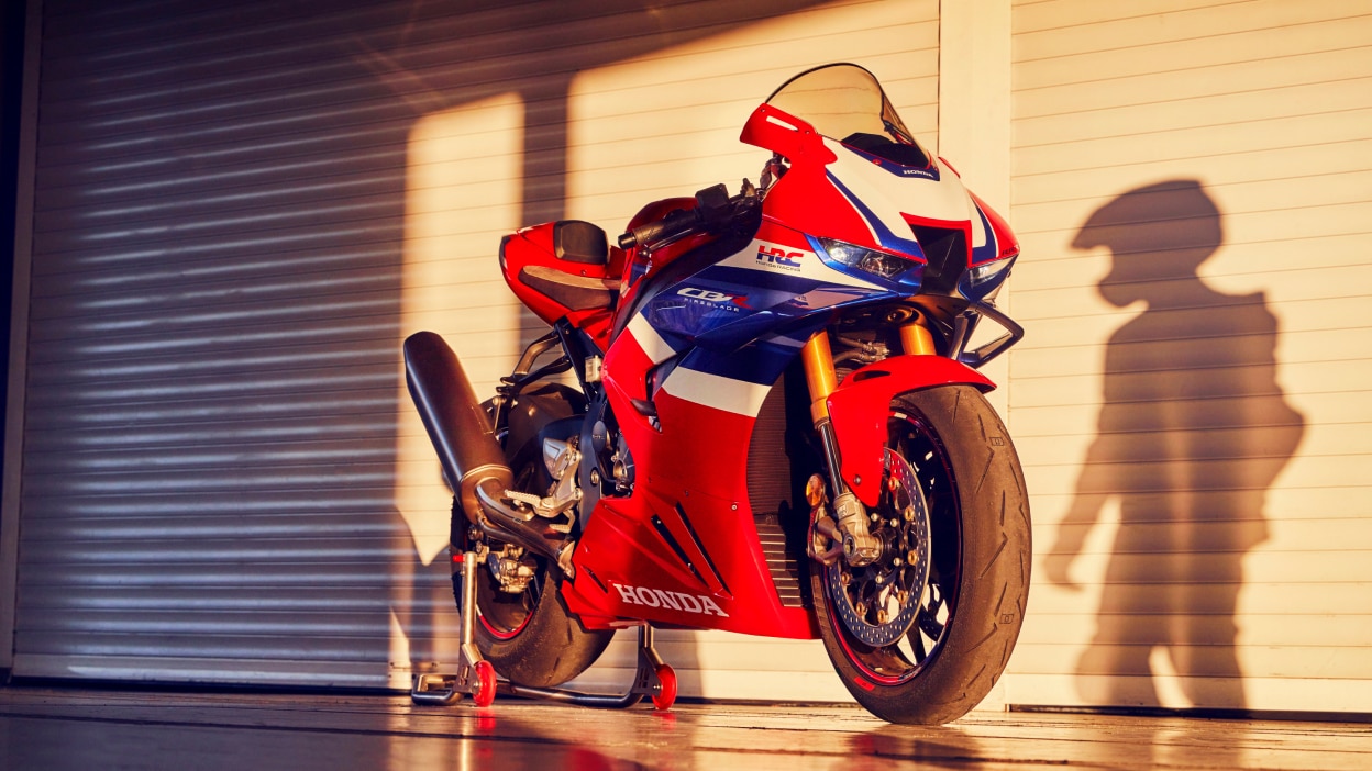 CBR1000RR-R Fireblade stationary on road.