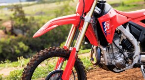 A close up of the Showa fork of a Honda CRF450RX